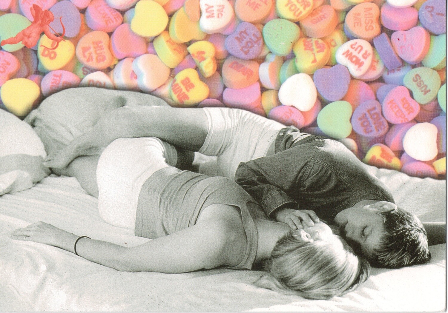 VALENTINE CARD-GIRLS ON BED W/ CANDY BACKGROUND