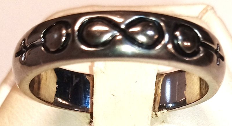 RING - FEMALE SYMBOLS WITH ETERNITY SYMBOL BETWEEN SIZE 10 RING - FEMALE SYMBOLS WITH ETERNITY SYMBOL BETWEEN SIZE 10