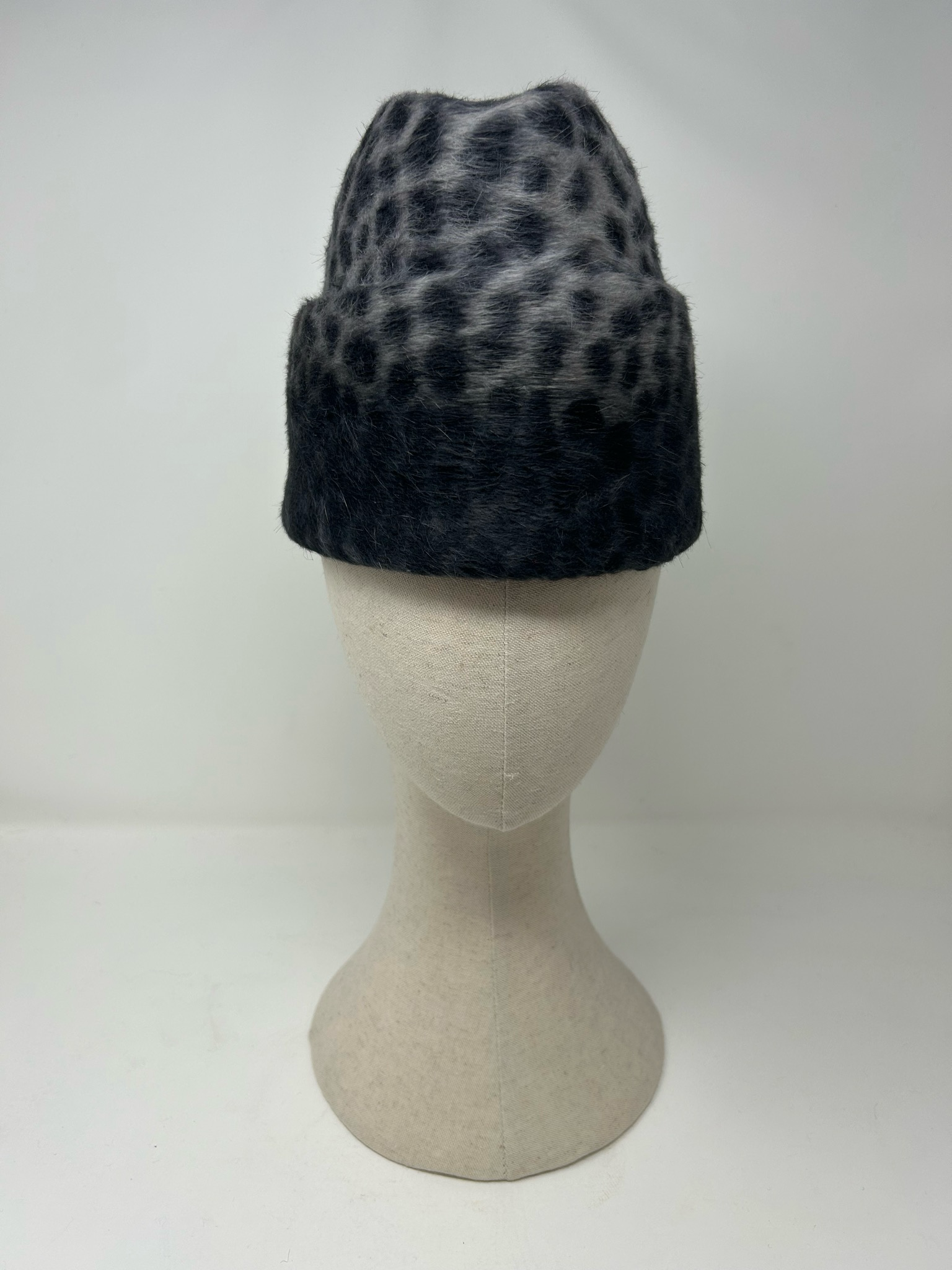 Envelope millinery by Otis Damón