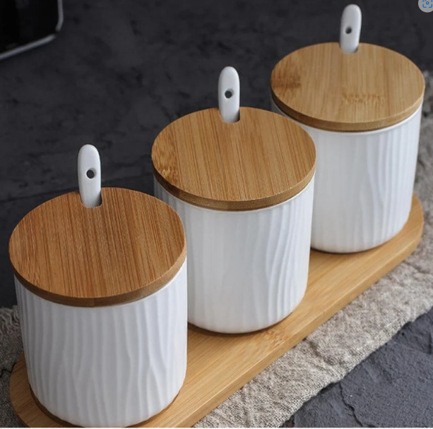 Beautiful Ceramic Jars. Ribbed Effect and include Bamboo Tray And Spoons. Perfect for kitchen storage and organisation