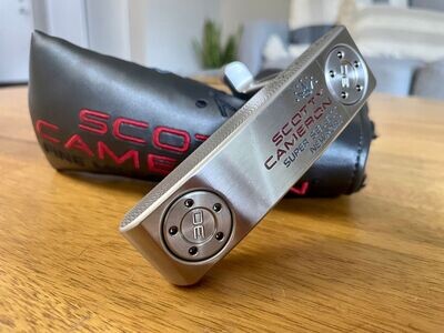 PUTTERS