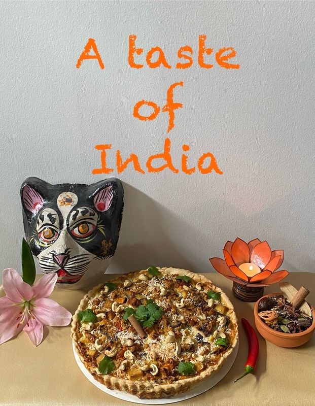 Gerja's Indian quiche met gebakken tofu, aubergine, zoete aardappel, kikkererwten, kokos, cashewnoten, chilipeper & typische Indische kruidenmix