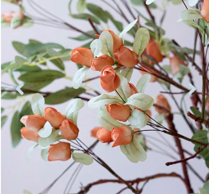 Tiny Orange Roses and Green Leaves