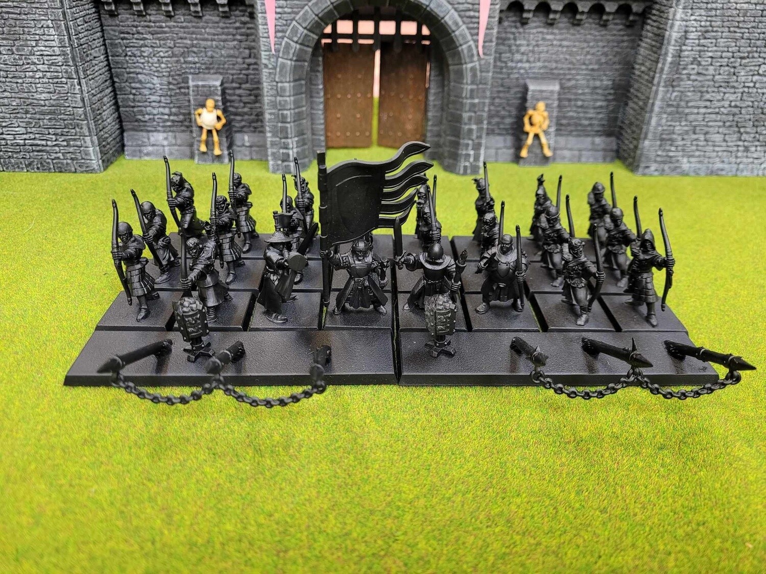 Bretonnian Peasant Bowmen (x24) with Defence Stakes (x2)
