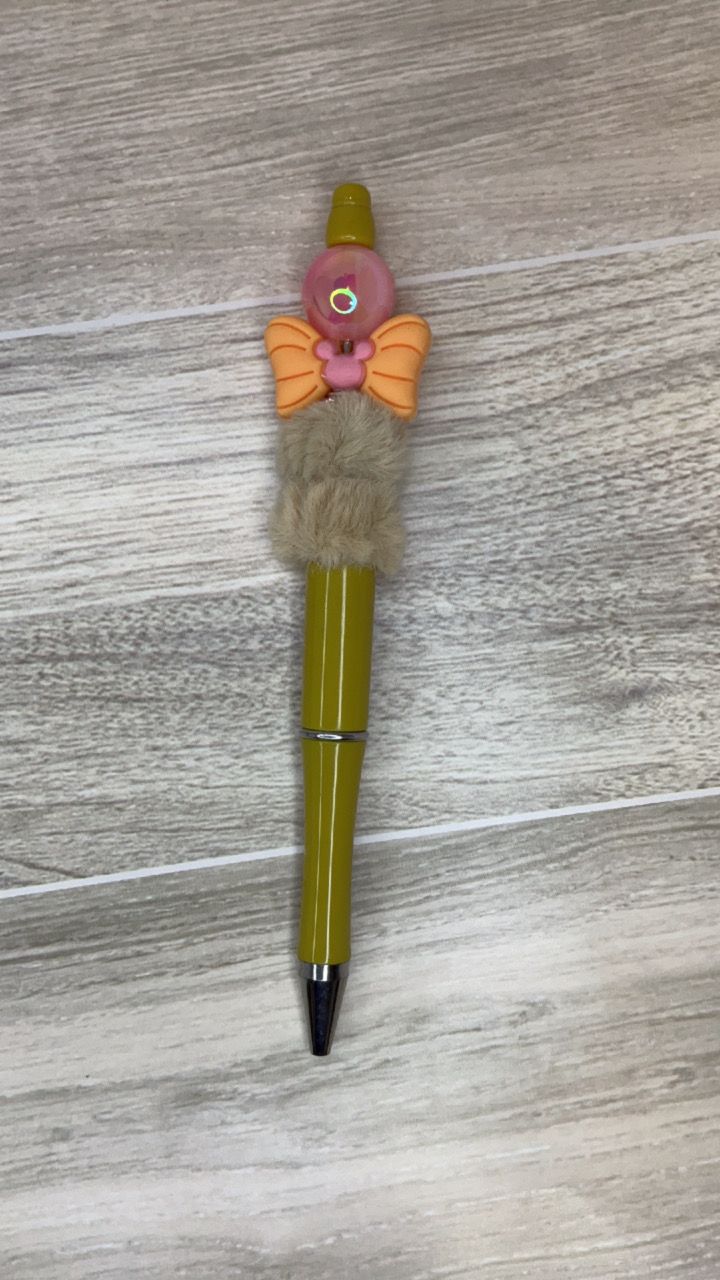 Tan pen Pink bead with orange Bow focal