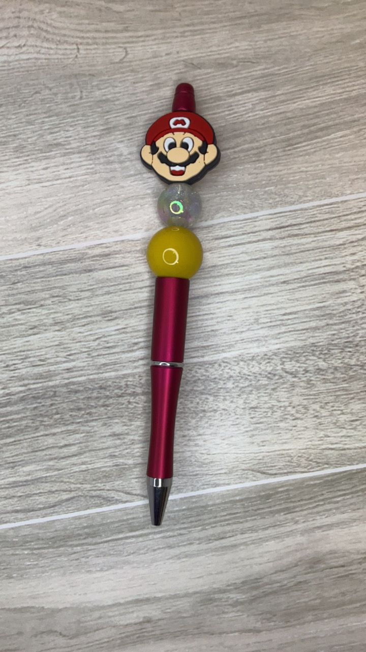 Red pen Mario focal