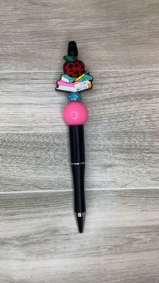 Black pen with Books and Red Apple focal
