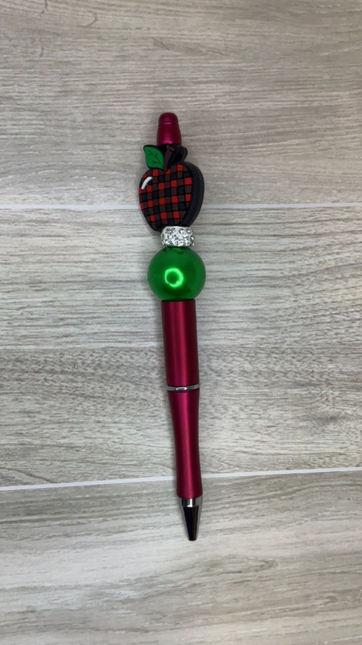 Red pen with Apple focal