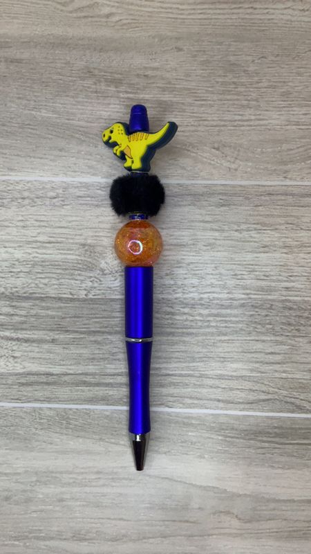 Blue pen with Yellow Dinosaur focal