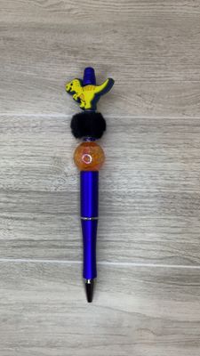 Blue pen with Yellow Dinosaur focal