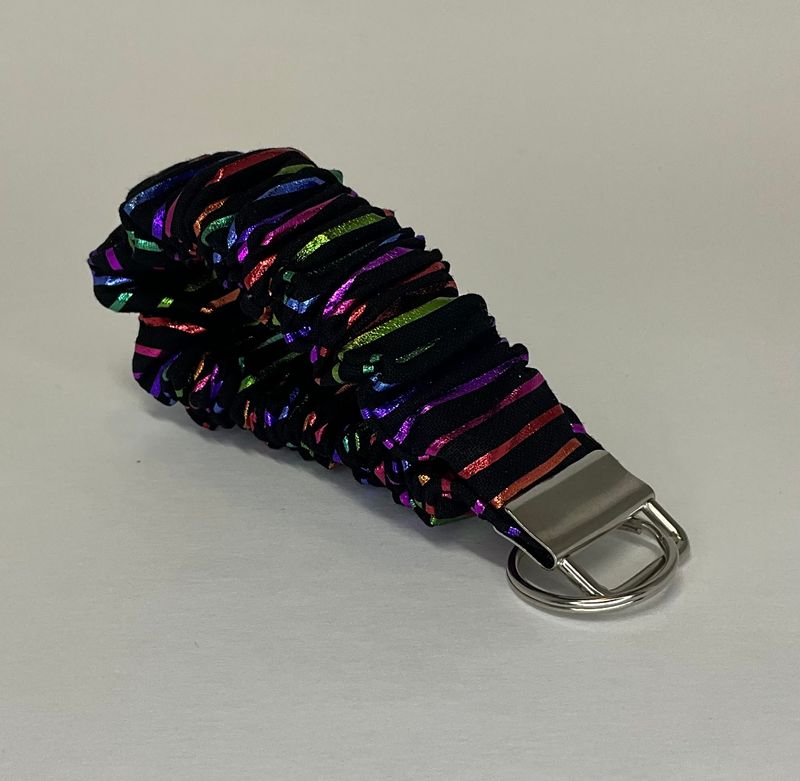 Black with metallic rainbow stripes