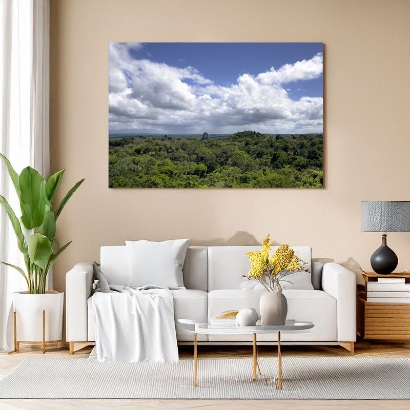 Canvas print of Tikal ruins in vast green jungle with dramatic sky, stylish wall art for living room