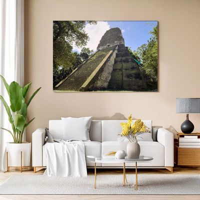 Canvas print of steep Tikal temple rising from jungle, dramatic art for modern living room