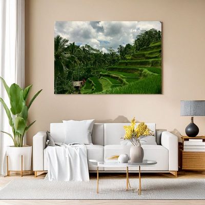 Canvas print of lush Bali rice terraces with palm trees creating tropical vibe in living room