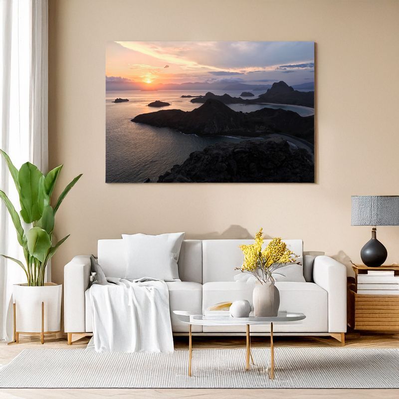 Canvas print of Komodo islands at sunset with dramatic light and water reflections for decor