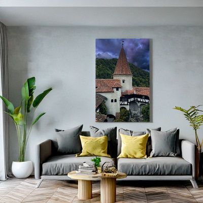 Bran Castle - Legend of the Carpathians Bran Castle tower wall art in modern room with grey sofa and yellow pillows.