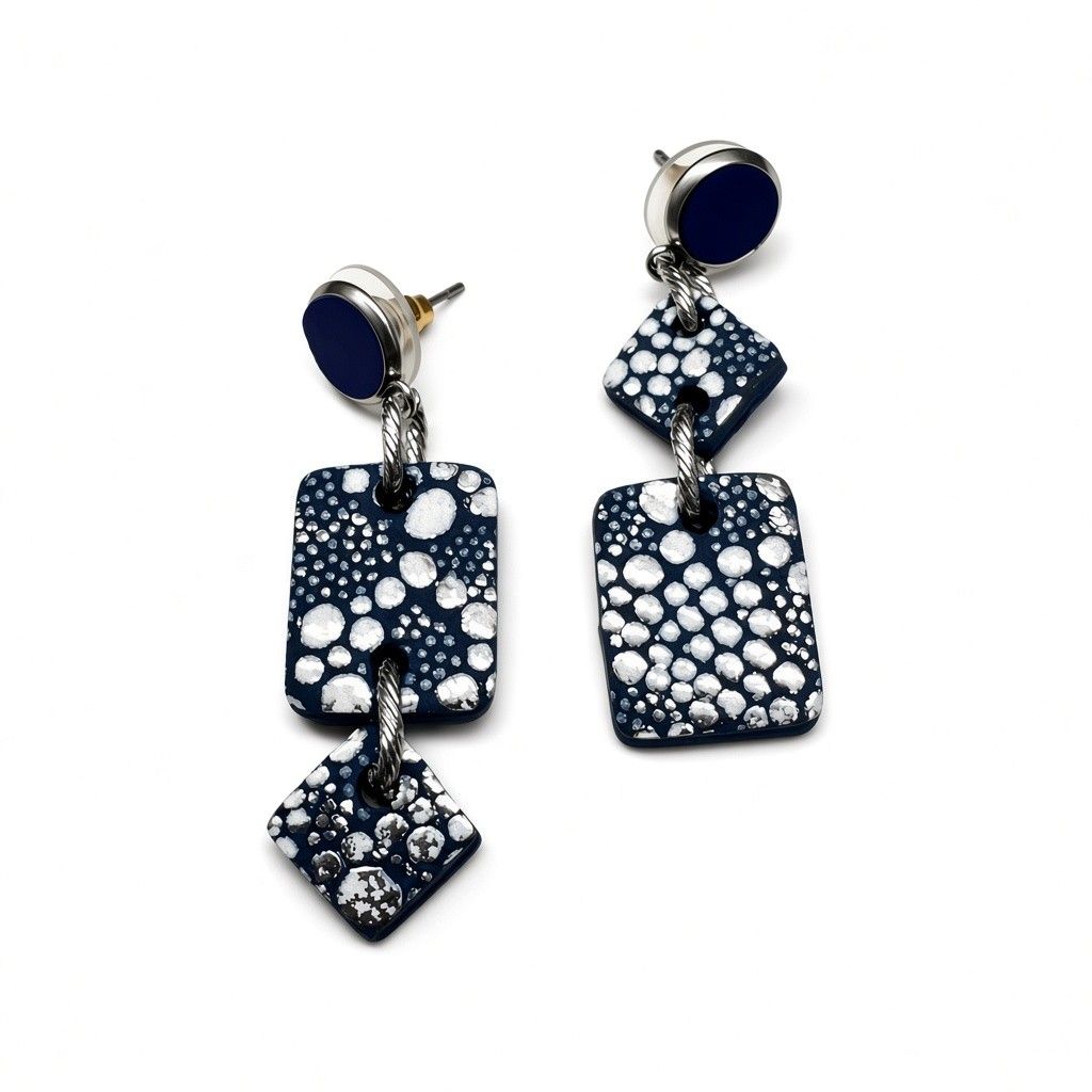 Boucles en cuir asymétrique bleu et argenté