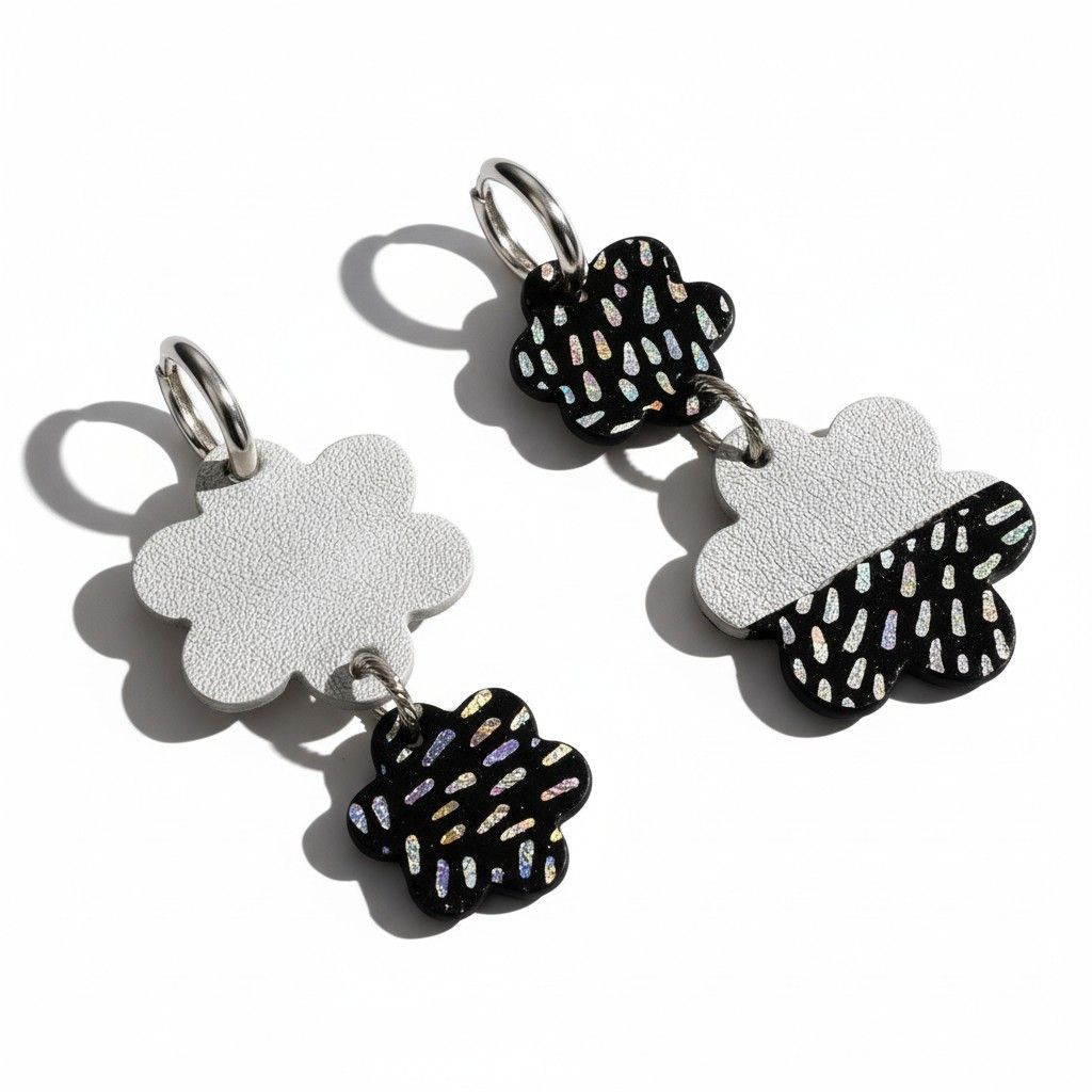 Boucles asymétrique fleur argenté et noir