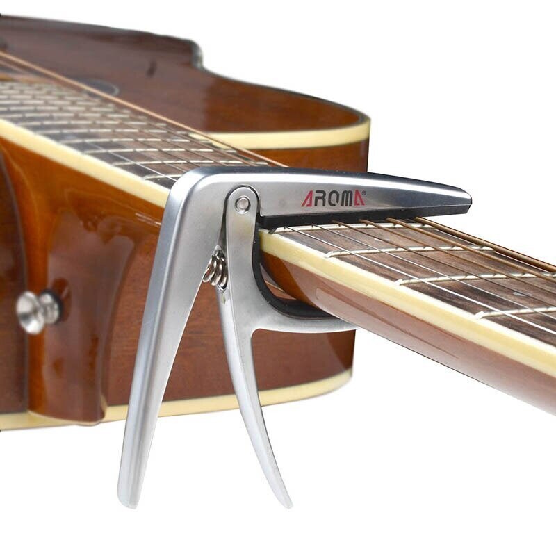 Aroma Classical Guitar Capo, Zinc alloy material, Steel spring, High quality silicone cushion, SILVER