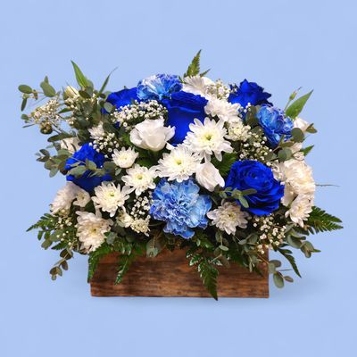 Imperial Flower Box with royal blue roses, white mums, lisianthus and carnations in rustic wooden container
