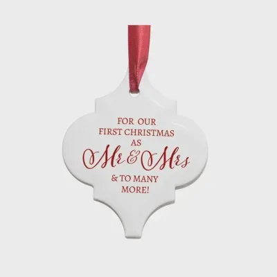 Mr and Mrs First Christmas ceramic marbled Arabesque ornament with sentiment on white background
