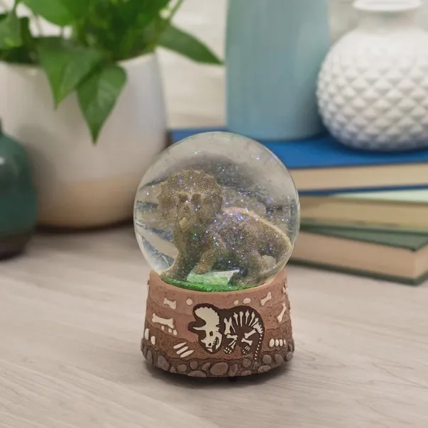 Triceratops Bone Dig Musical Snow Globe