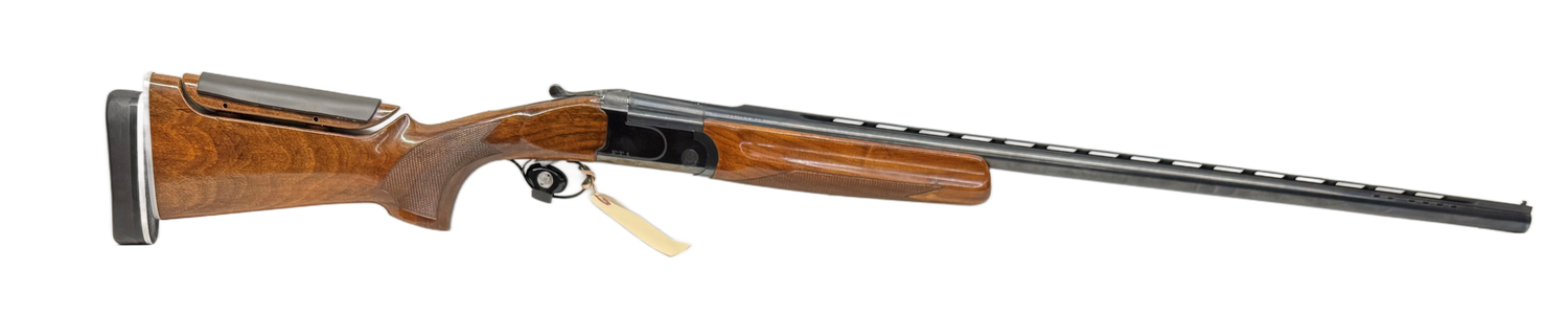 CG-0209 Frigon Trap model FT1 12 ga X 2 3/4" fixed full choke 34" barrel.  Stock adjustable comb and adjustable Kick-Eez recoil pad. With take-down luggage case.