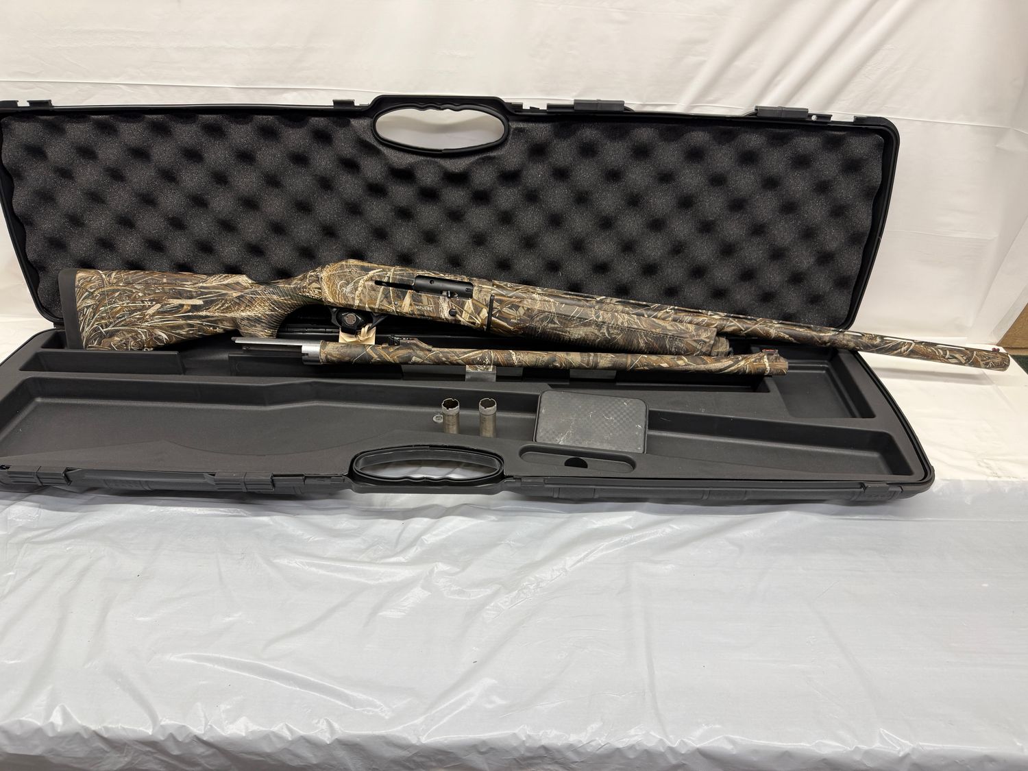 UG-21475 Taiga Impulse 12 Ga X 3 UG-21475 Taiga Impulse 12 Ga X 3" Semi-Auto Shotgun, 2 barrel set, 28" vent rib barrel with 3 choke tubes and 24" smoth bore slug barrel, Real-Tree Max 5 camo pattern in original hard case. Excellent