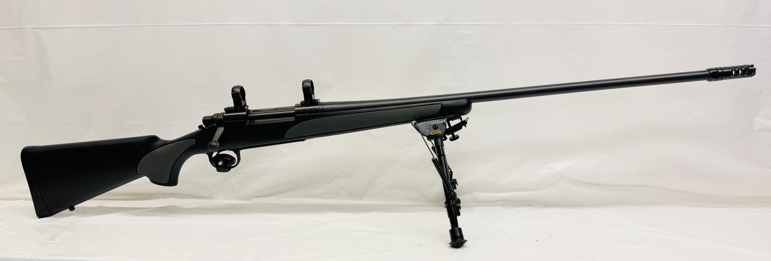 UG-22152 USED Remington Model 700 SPS c.300 Win Mag Bolt Ac. Rifle  W/ 26" Barrel. Includes Burris Steel Rings with Weaver Bases, After Market Muzzle Brake, 9-13" Caldwell Bipod - Good Condition!
