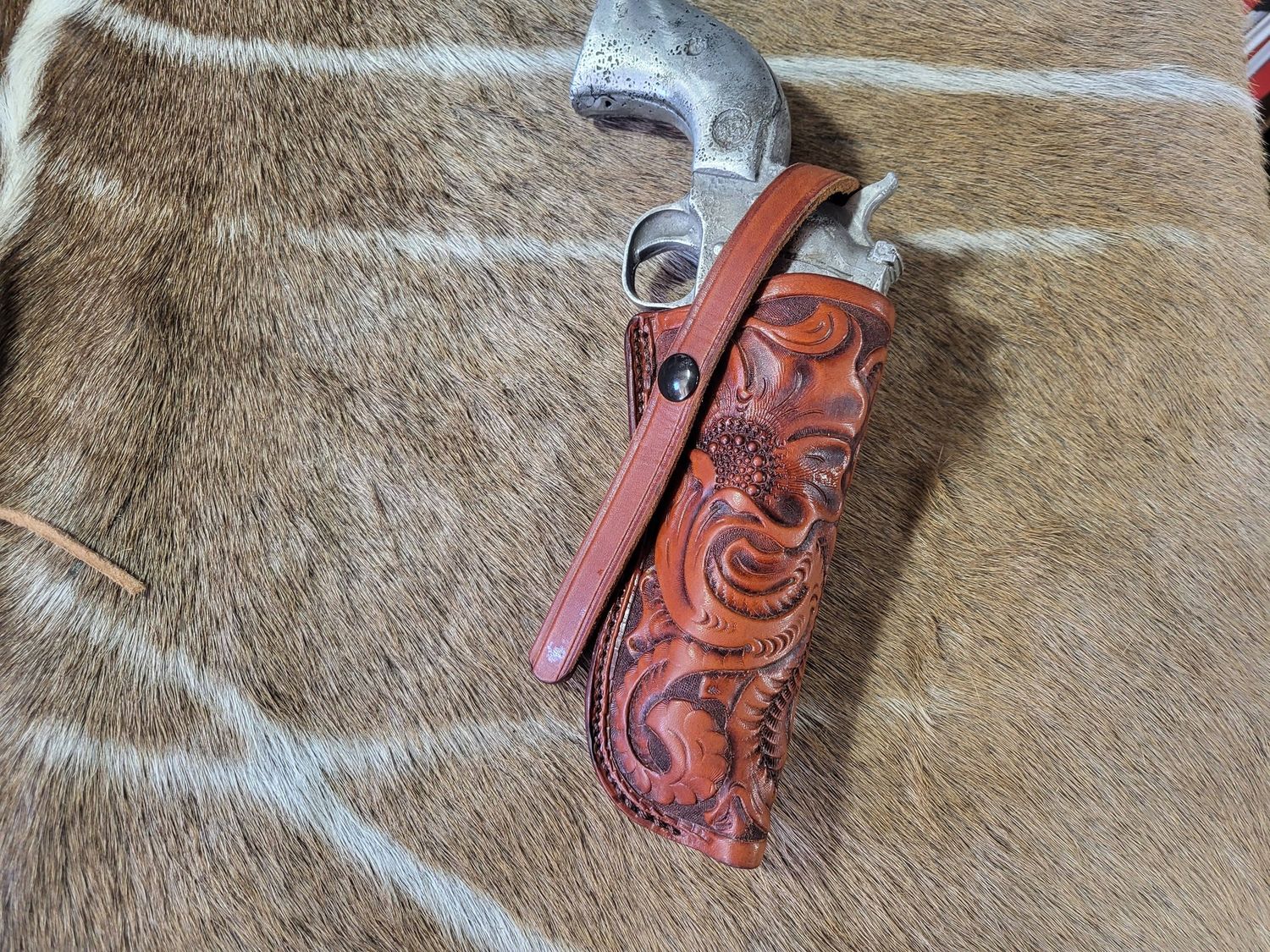 4 5/8" Floral Tooled holster for a Ruger Single 6 or Wrangler