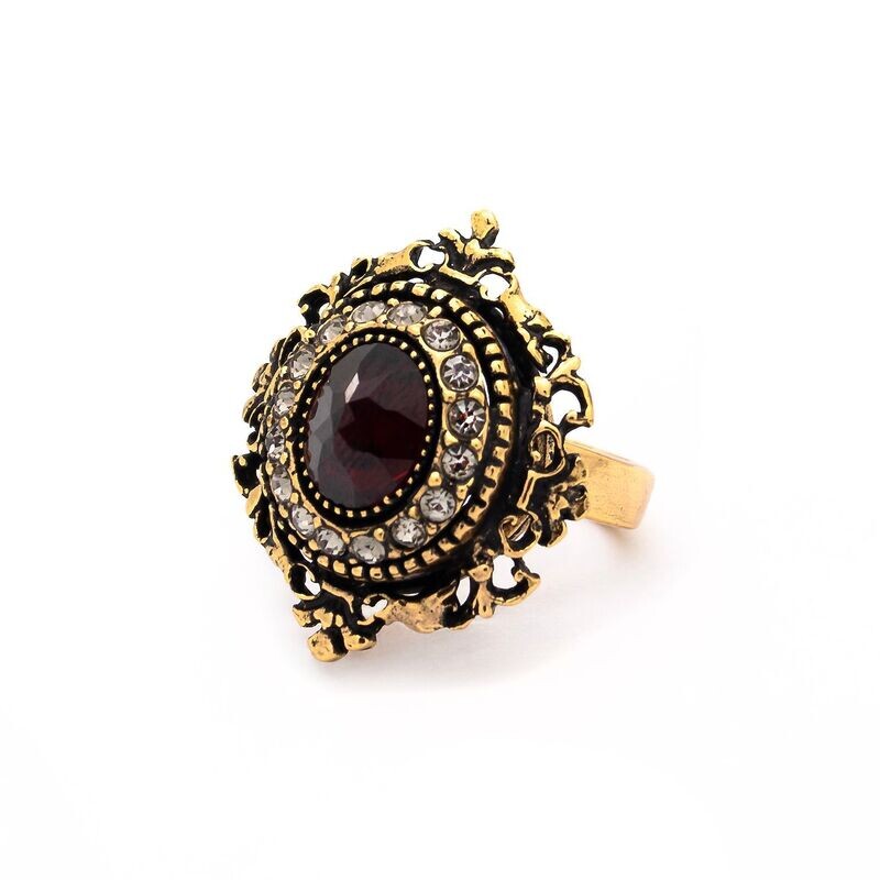 Anello con granato e cristalli