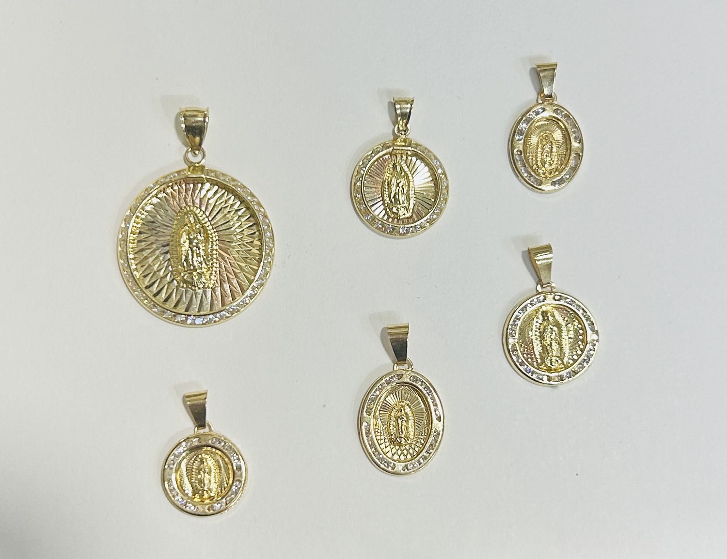 charm 14k saints