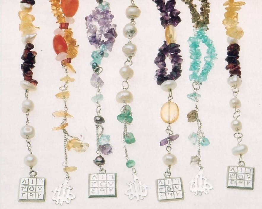 GEMSTONE BRACELET WITH MAGIC SQUARE TASSEL