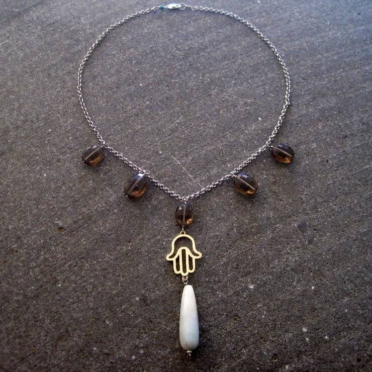 HAND OF FATIMA NECKLACE WITH CUT STONES