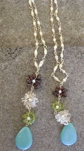 Necklace with 3-tier flower. turquoise drop.