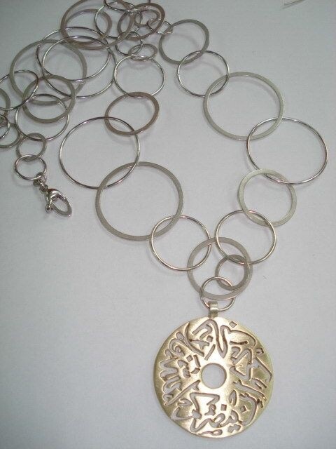 MED DISC ON SILVER HOOPS