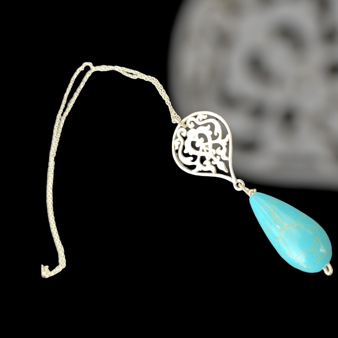 Chain necklace with arabesque and turquoise drop