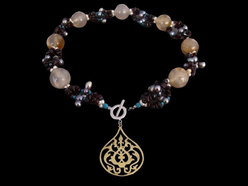 EMBROIDERED STONES WITH GP ARABESQUE