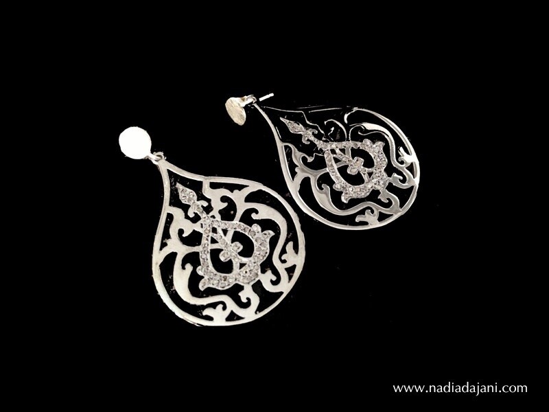 LARGE ARABESQUE EARRINGS. DIAMONDS