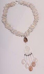 KEISHI PEARLS WITH ARABESQUE AND TASSELS