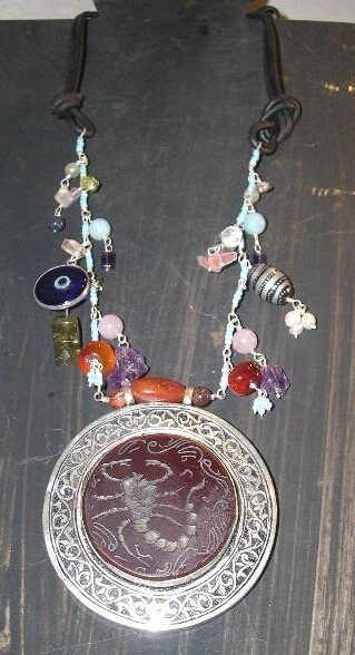 LEATHER &amp; CHARM NECKLACE WITH OLD AFGHAN CENTRE MOTI