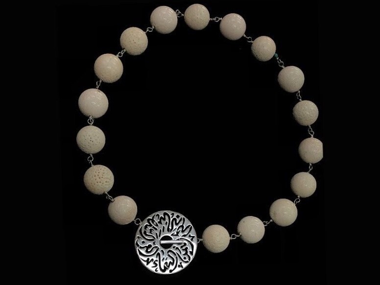 PINK CORAL NECKLACE WITH SILVER DISC CLOSURE