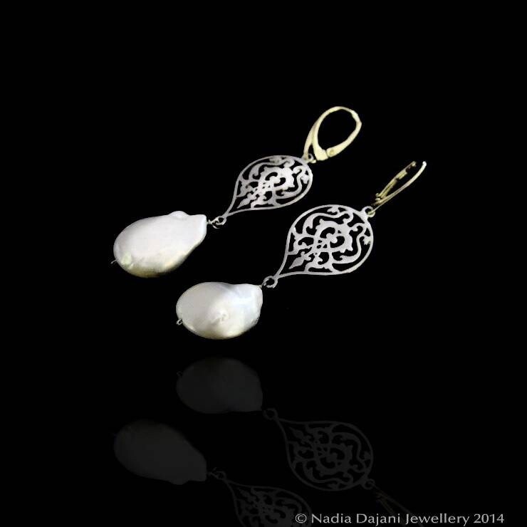 SMALL ARABESQUE. LARGE BAROQUE PEARL
