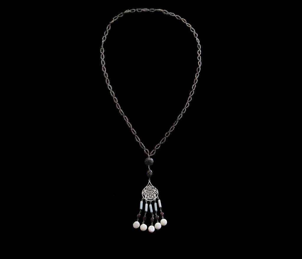 LONG PEARL NECKLACE. LARGE ARABESQUE AND TASSELS