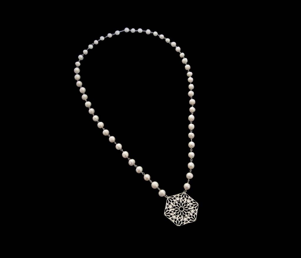PEARLS AND A SILVER HEXAGON