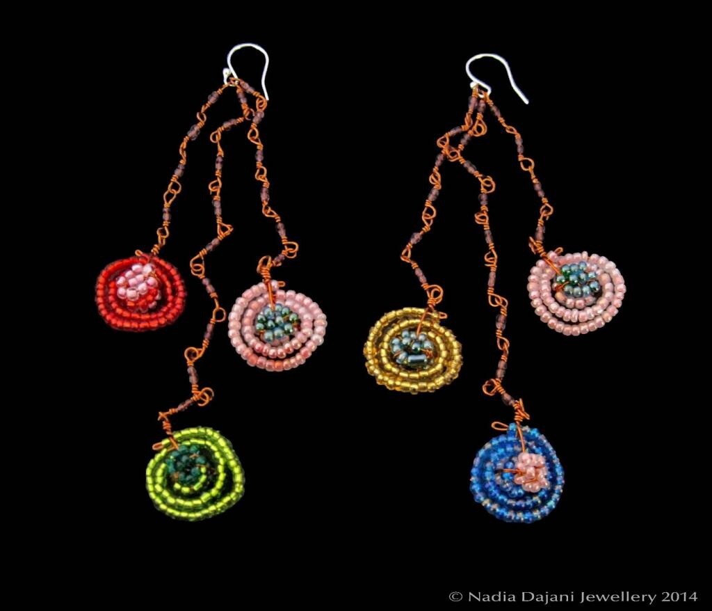 Long bead swirl shower earrings