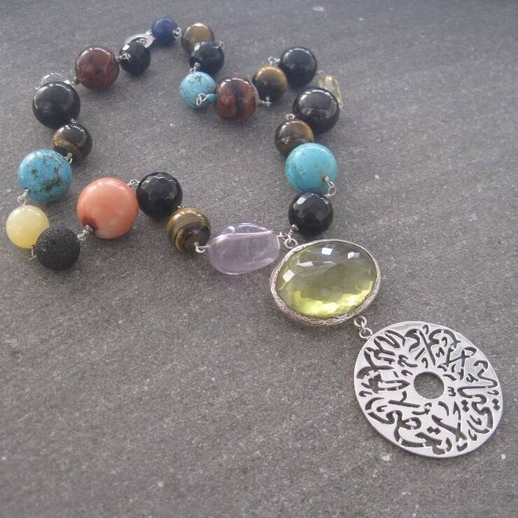 MIXED GEMSTONES WITH LARGE DISC PENDANT
