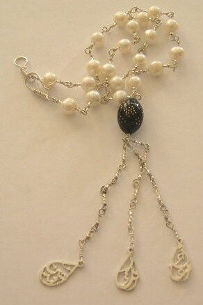 PEARL WIRE NECKLACE WITH AIN RABUKA TARAAK