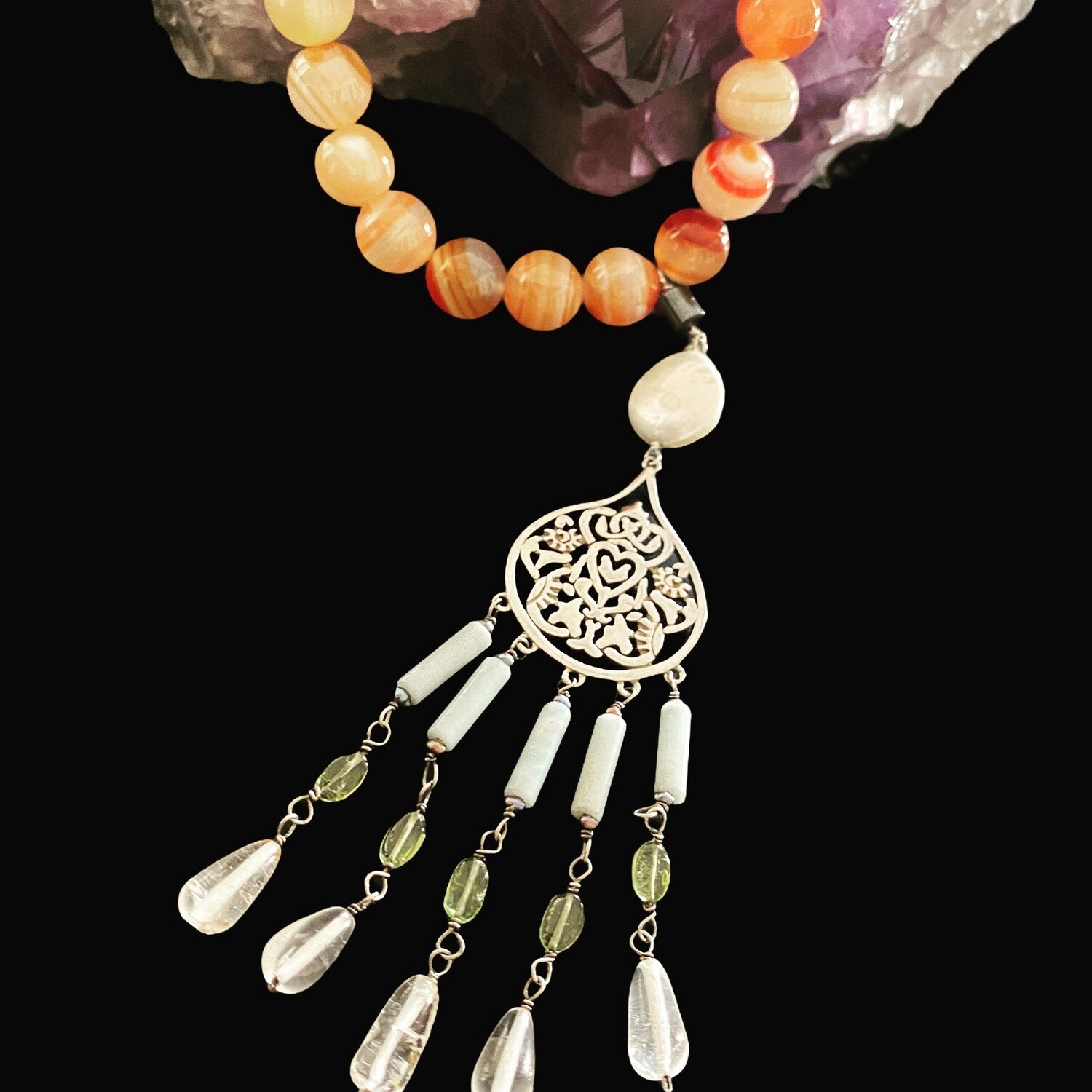 NECKLACE WITH ARABESQUE AND TASSELS