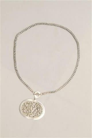 OVAL MASHA'ALLAH PENDANT ON A SILVER CHAIN FRONT CLASP